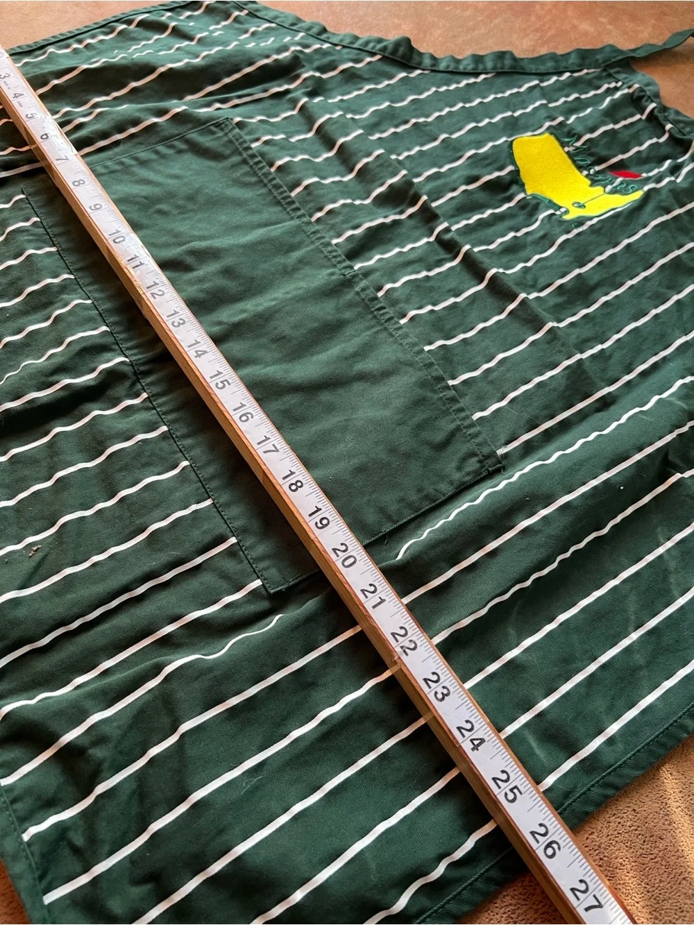 Masters Golf Dark Green Pinstripe Apron with Yellow & Red Golf Emblem